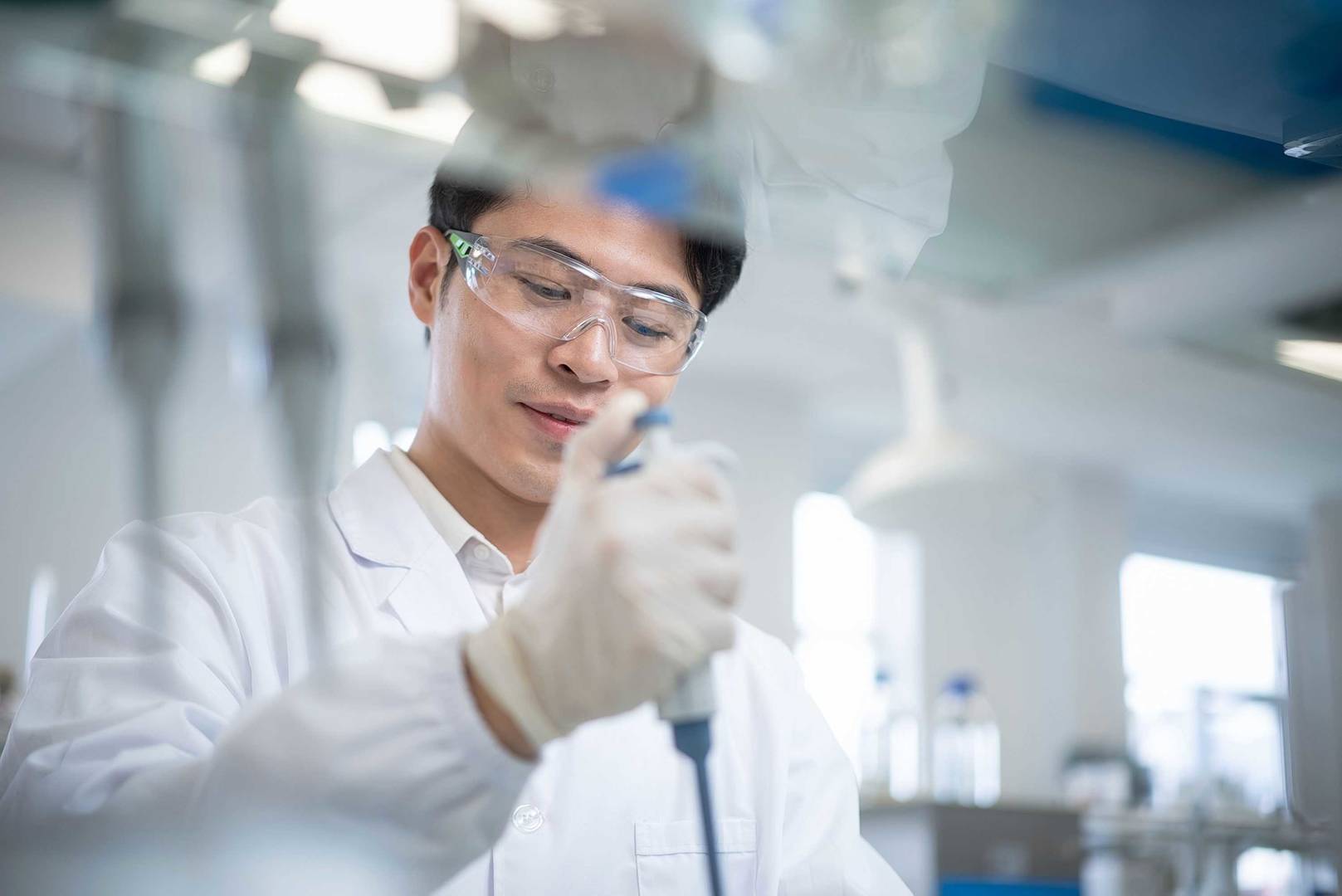 Scientist doing experiment in lab
