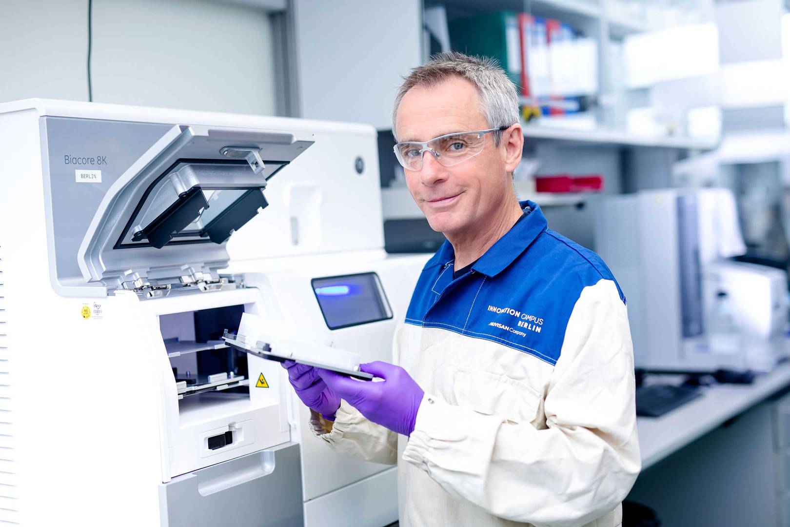 Technician prepares Biacore 8K for sample measurement
