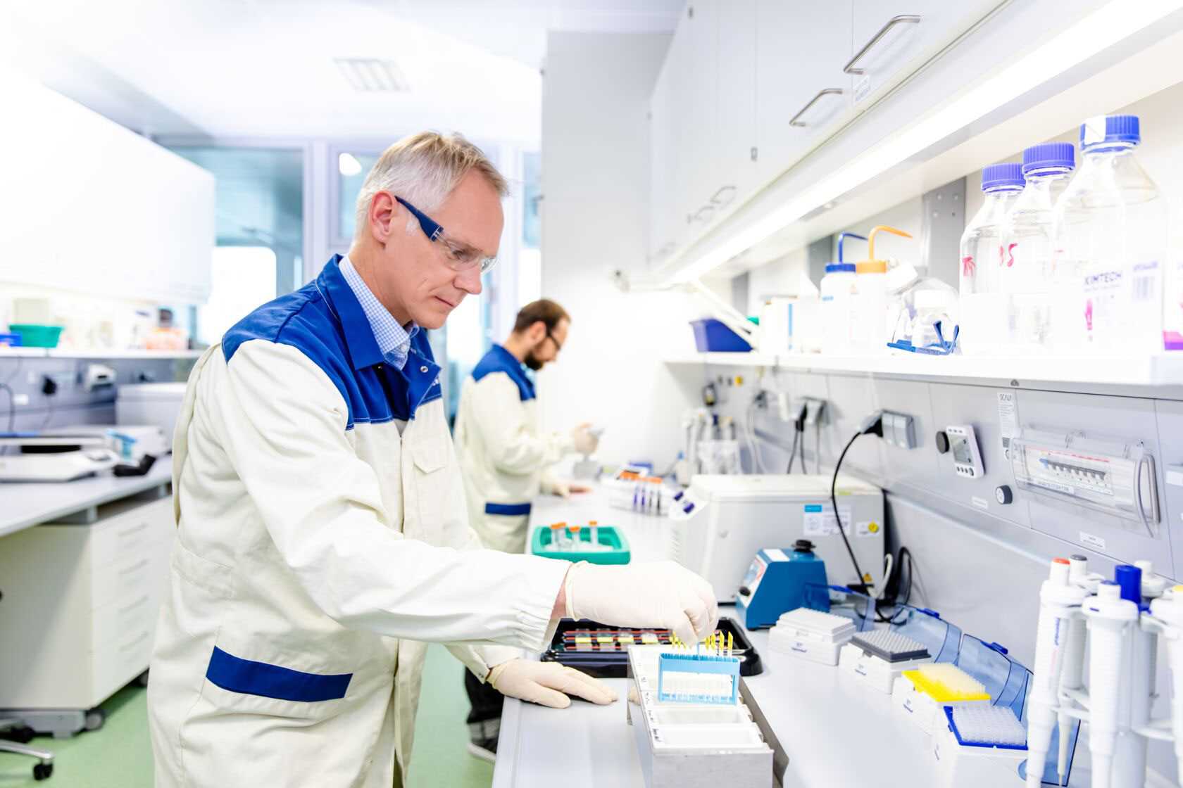 Biomarker scientists performing immunohistochemistry