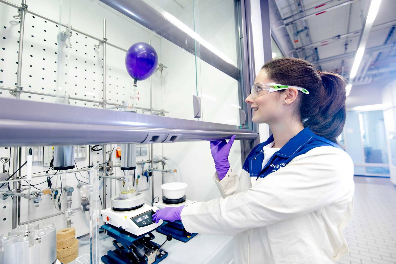 Scientist running a reaction under an inert atmosphere