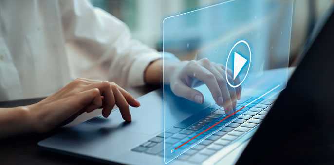 Hand using laptop and press screen to video streaming on internet online